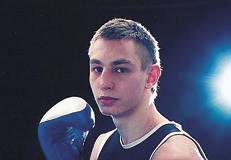 medal tigera Damian Kiwior